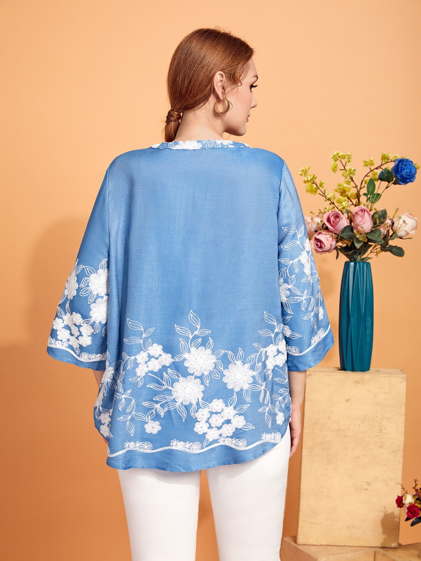 Plus Floral Embroidery Curved Hem Top