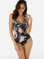 Wholesale Black V-Neck Sleeveless Floral Print Backless Tie-Up Ruffle Hem One-Pieces