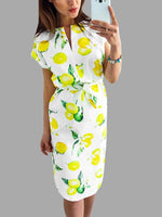Wholesale Yellow Round Neck Short Sleeve Floral Print Curved Hem High-Waisted Dress