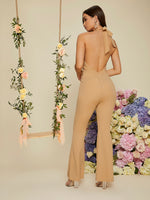 Backless Halterneck Slant Pocket Flare Leg Jumpsuit
