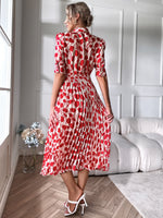 Allover Print Tie Neck Plicated Hem Dress