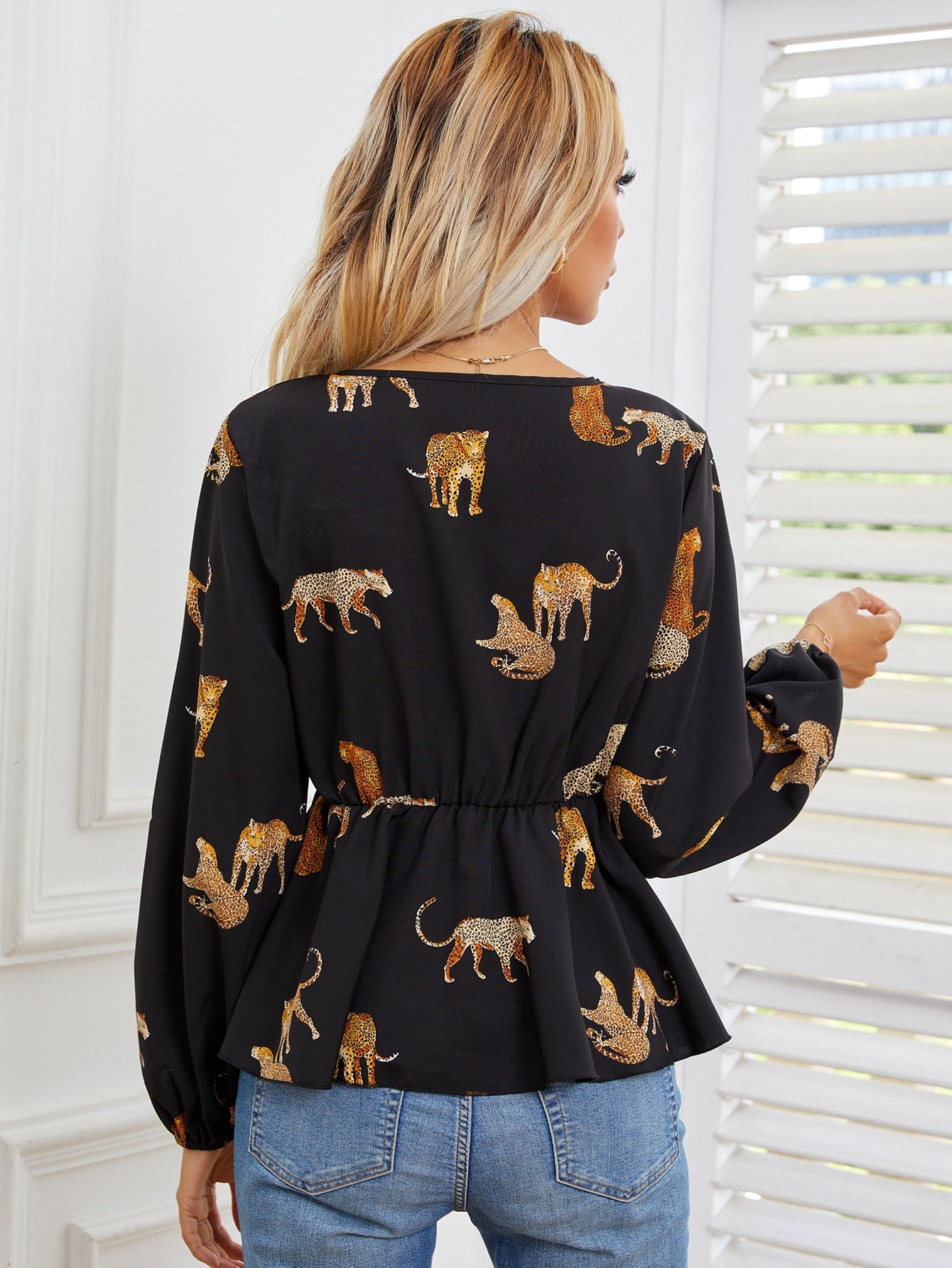 Leopard Print Lantern Sleeve Peplum Hem Blouse