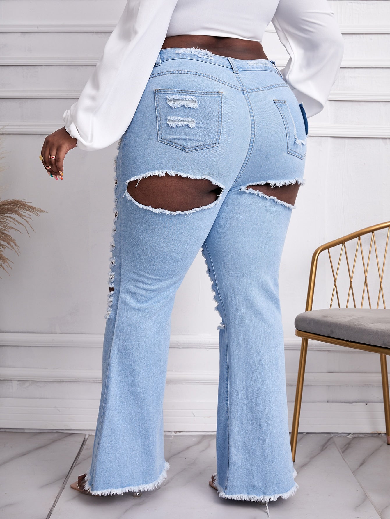 Plus High Waist Ladder Distressed Raw Trim Flare Leg Jeans