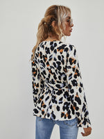 Surplice Front Allover Print Belted Blouse