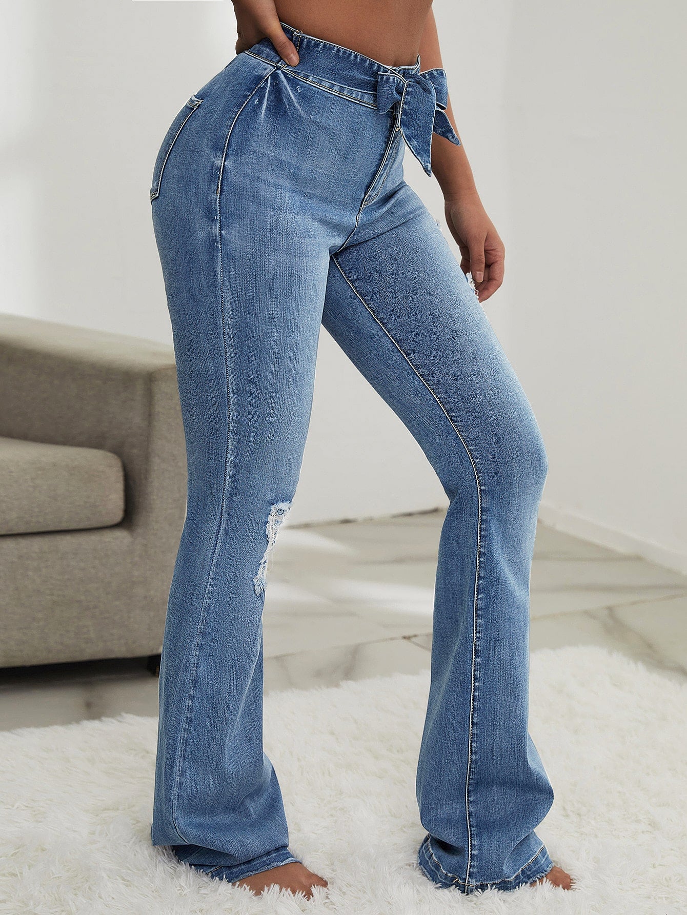 Ripped Belted Flare Leg Jeans