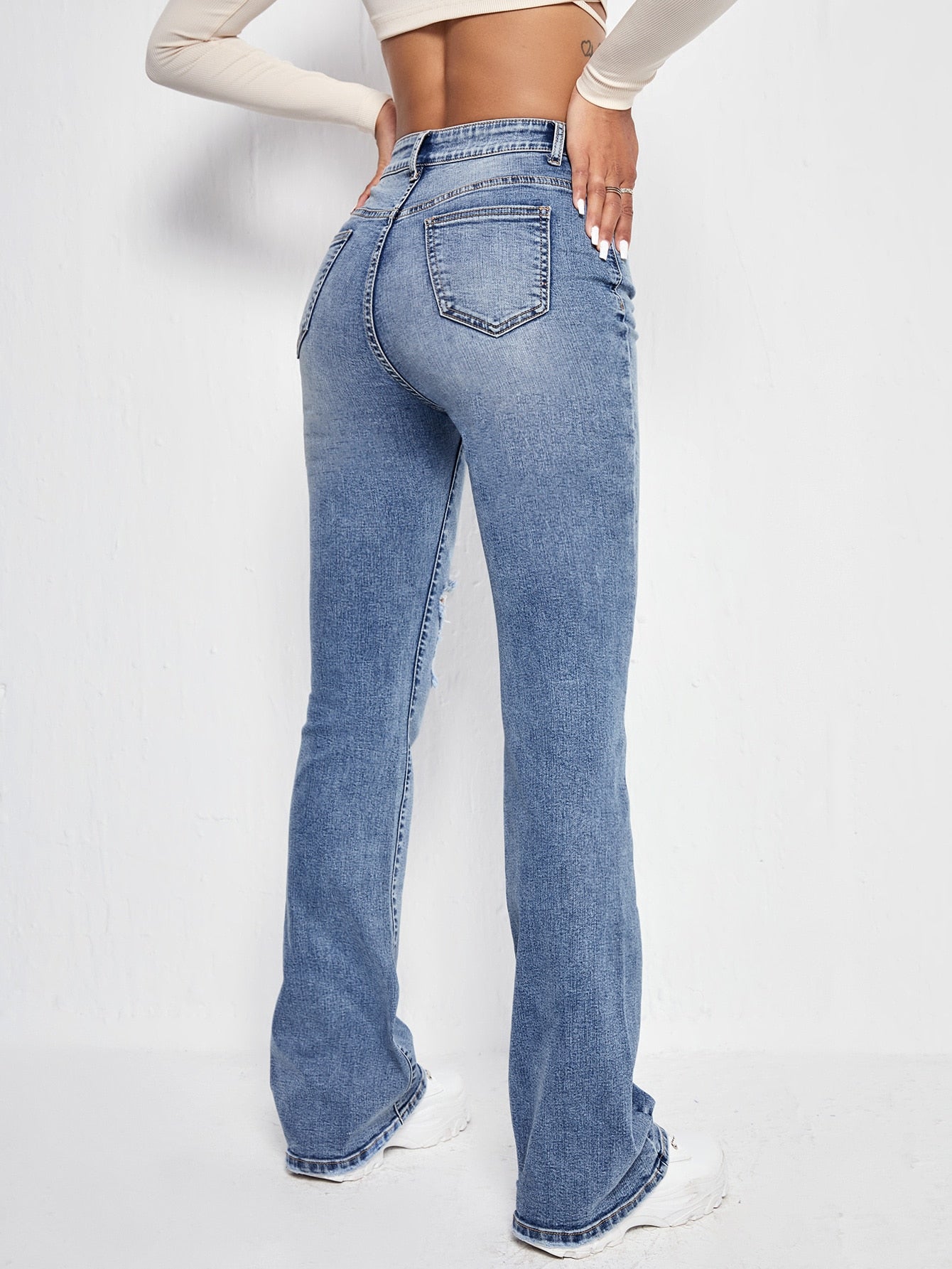 Slant Pocket Ripped Flare Leg Jeans