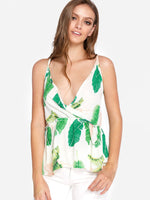 Wholesale V-Neck Floral Print Crossed Front Backless Spaghetti Strap Sleeveless Flounced Hem White Camis