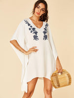 Wholesale White V-Neck Half Sleeve Floral Print Curved Hem Dresses